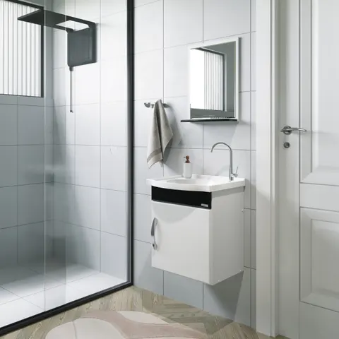 Gabinete suspenso branco AJ Rorato de 39 cm, com cuba e detalhe frontal preto, instalado em banheiro.